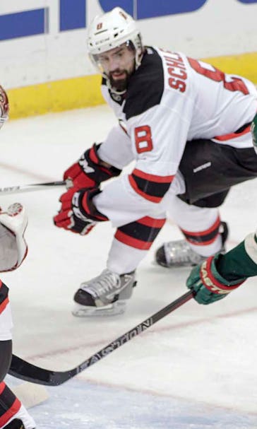 Parise scores, but Devils prevail in Minnesota